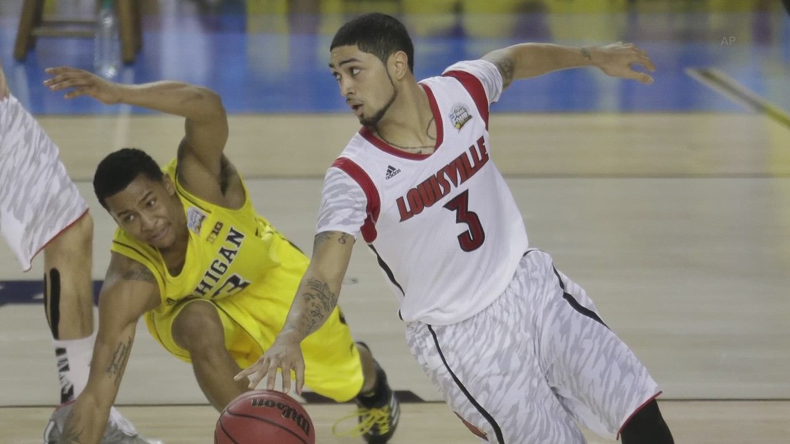 UofL's very own Peyton Siva doing his hand signal!  Peyton siva, Louisville  cardinals, University of louisville