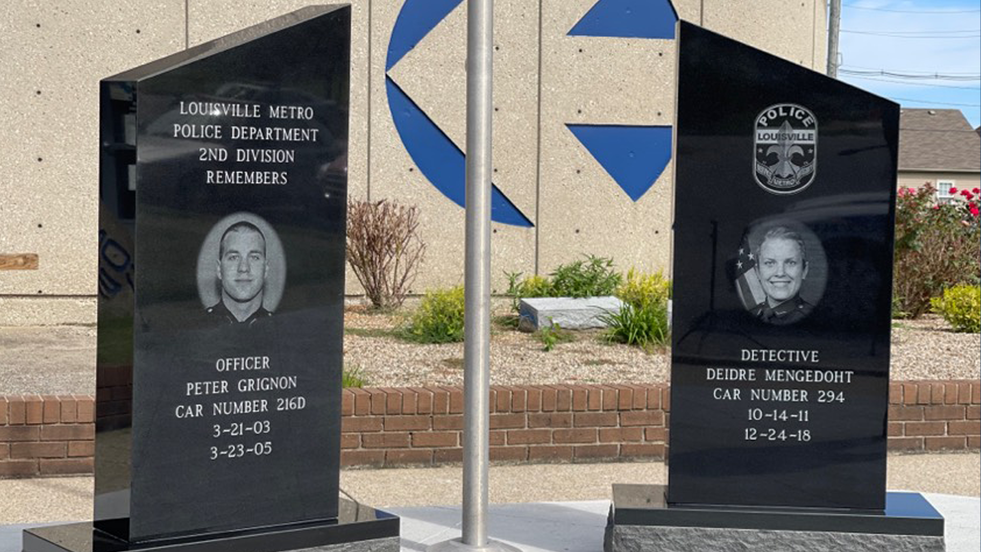 The memorials honors Officer Peter Grignon and Detective Deidre Mengedoht are located outside LMPD's second division.
