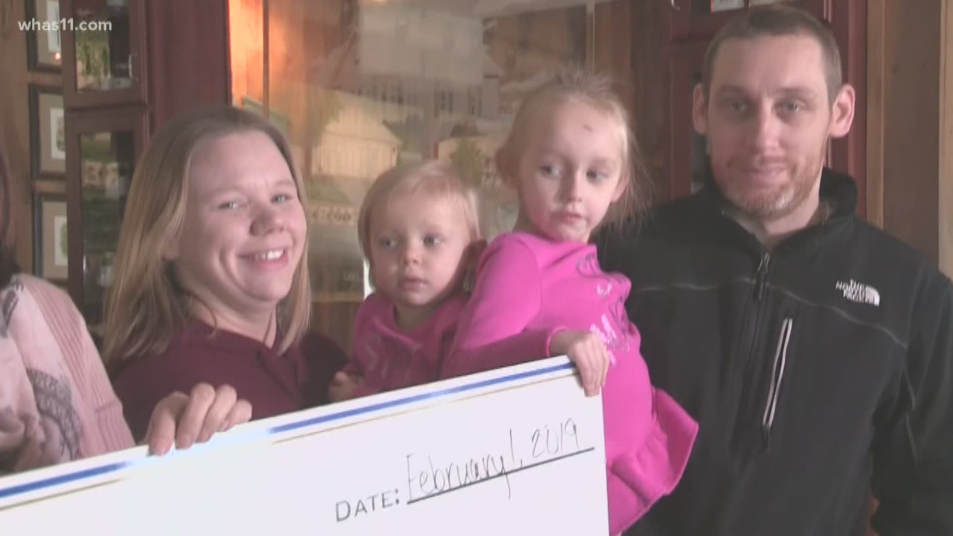Jenna Huber Clem, a third generation owner of the Huber Family Farm and Restaurant, presented the Crusade for Children with $16,833 from their GoFundMe page.