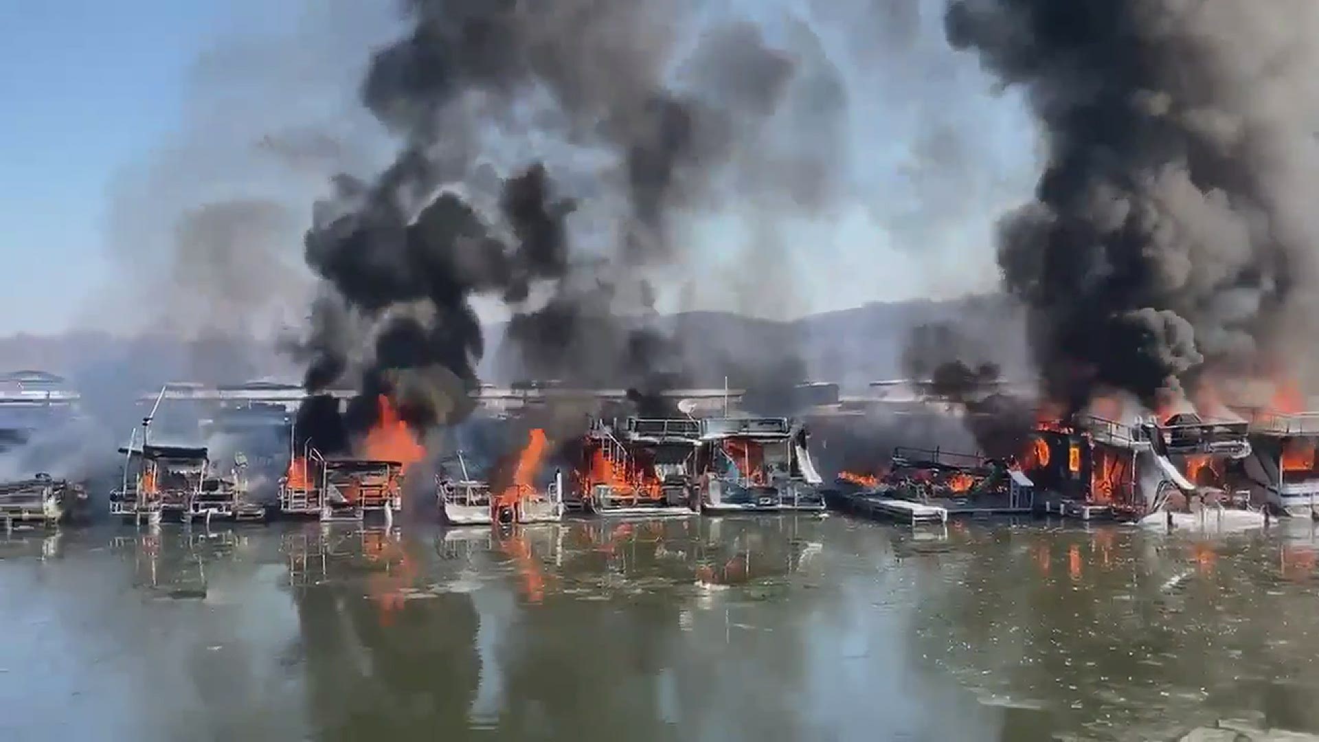 Video from the Indiana DNR shows multiple houseboats on fire at the Hoosier Hills Marina in Dubois County.