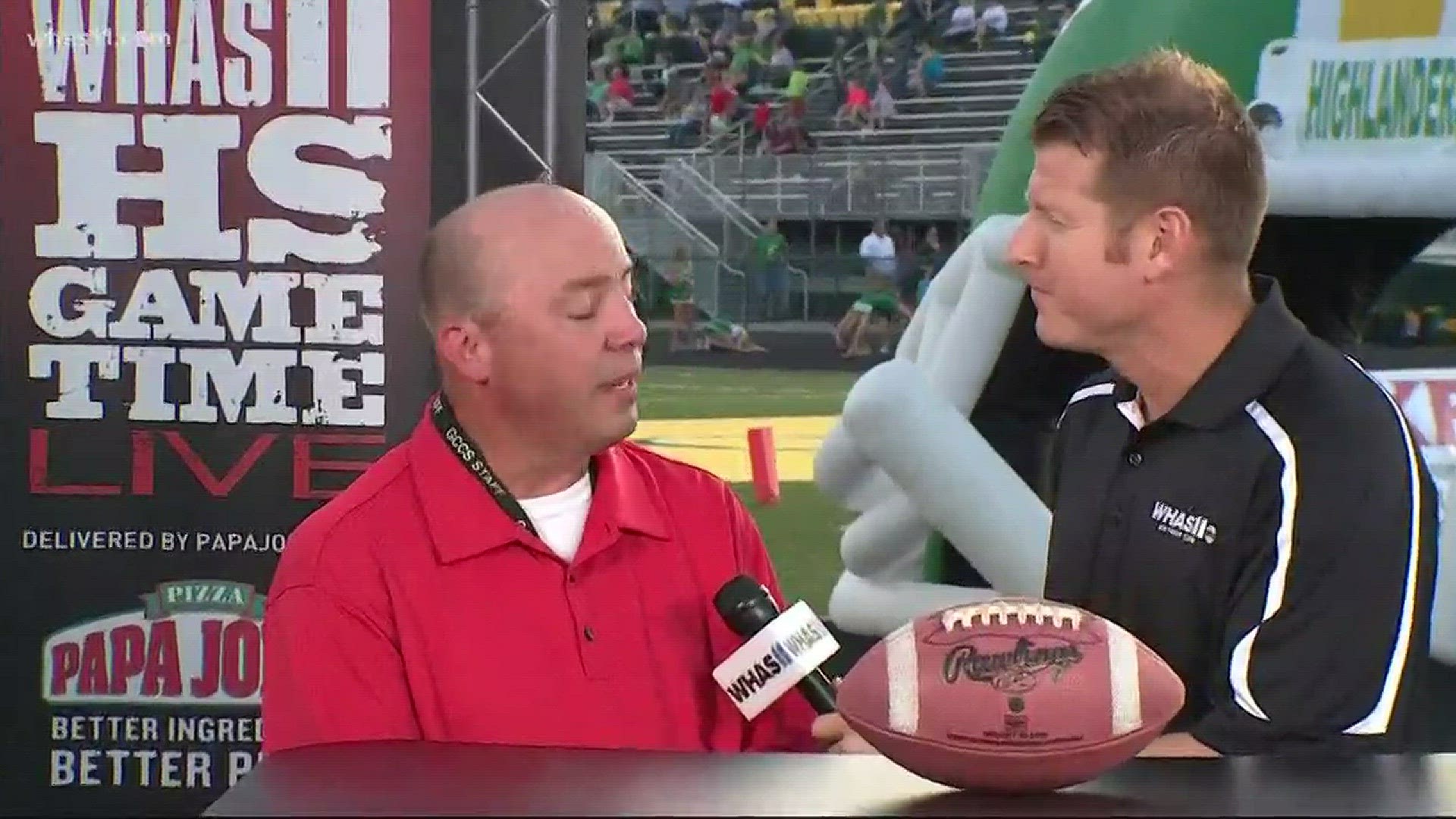 Kent talks with Jeffersonville's head football coach at HS GameTime