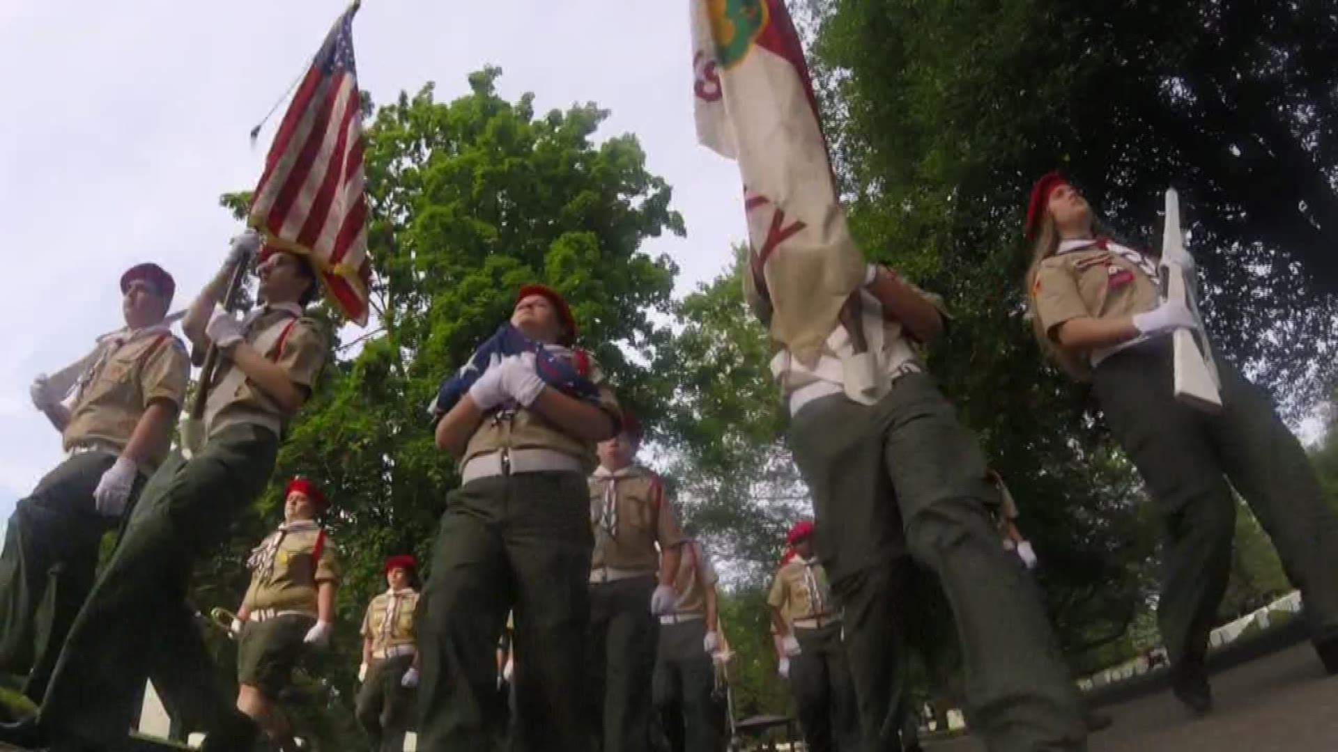 This morning, a group of about 250 Boy Scouts met at Zachary Taylor Cemetery to place flags on gravestones.