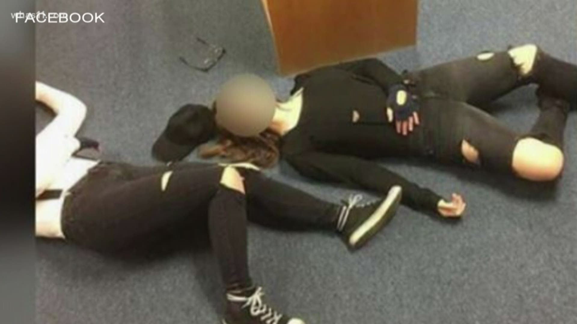 The two students have been suspended after dressing as the Columbine shooters who killed 15 people at their high school in 1999.