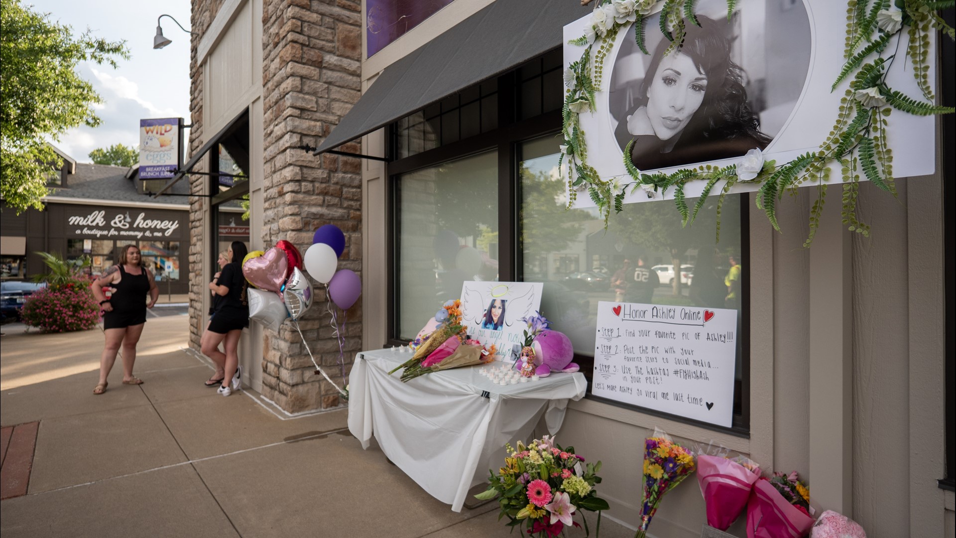 Countless people gathered around a makeshift memorial, posted up feet from where Ashley Yates lost her life, in Westport Village last Friday.