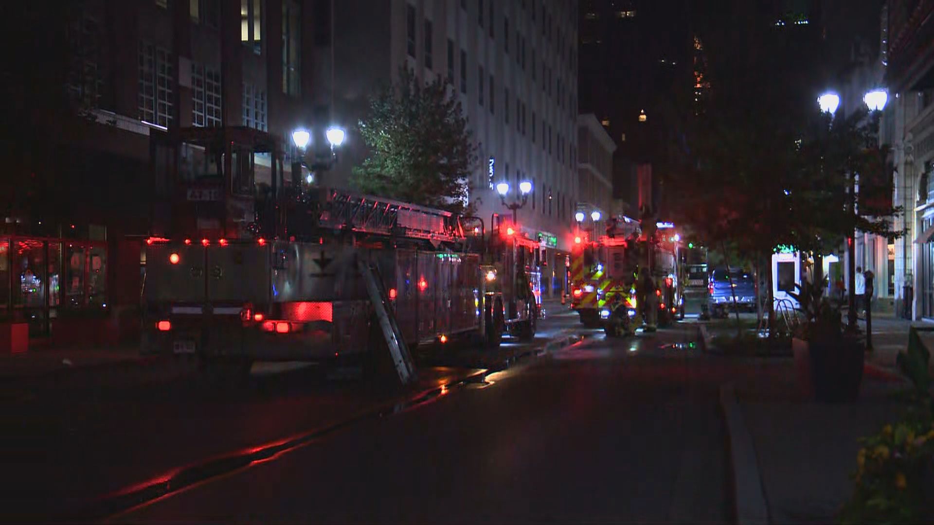 Louisville firefighters said they first got the call around 8:30 p.m. about a pile of trash on fire in the alleyway by the parking garage for the Hilton Garden Inn.