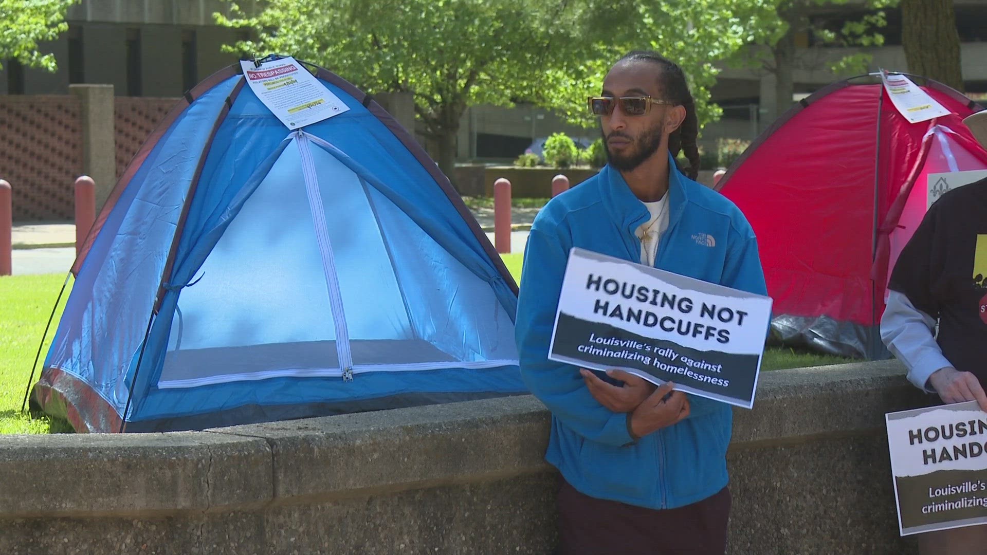 About 25 tents were set up throughout the downtown Louisville park with "no trespassing" citations attached to them.