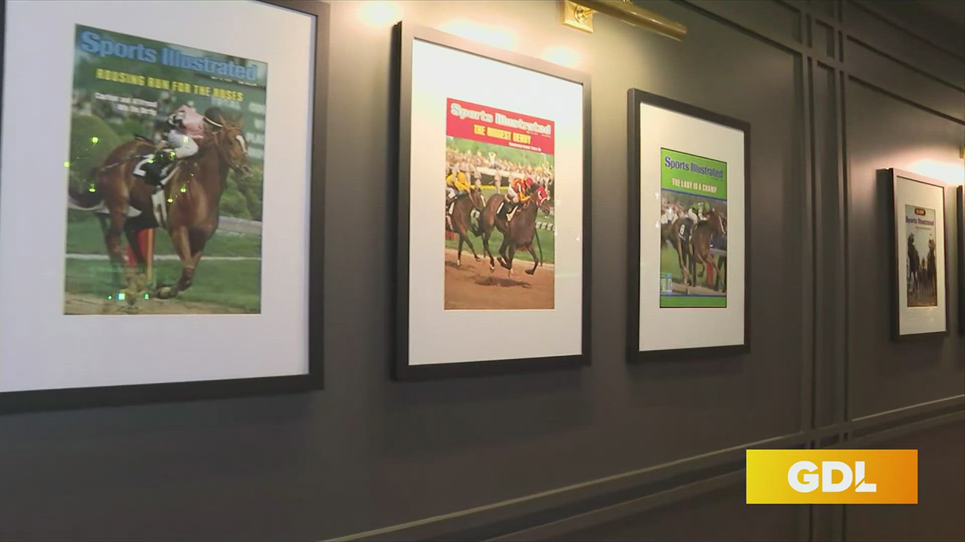 Club S.I. is a luxury space that features sports illustrated covers of Kentucky Derby Winners.