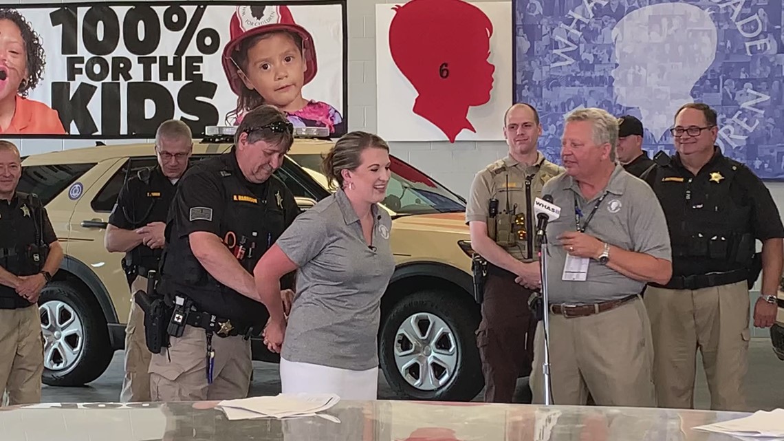 Officers help Brooke Hasch raise money for WHAS Crusade For Children