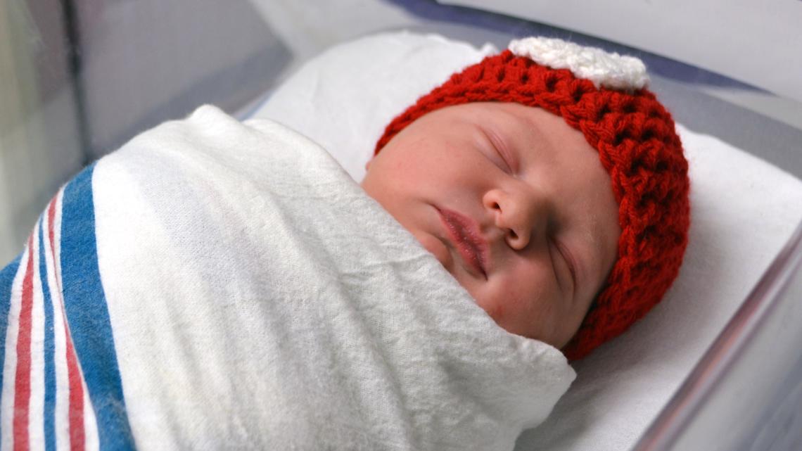 Newborns at Baptist Health Louisville receive red hats in honor of