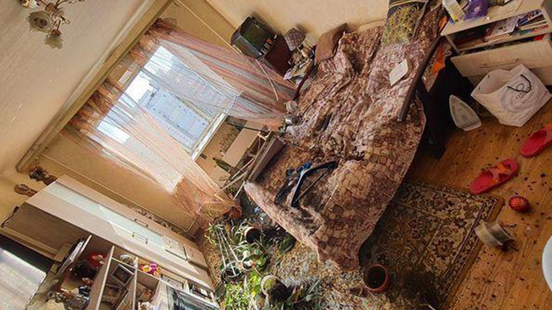 Cell phone video shows what remains of Kyiv apartment complex damaged by Russian rocket