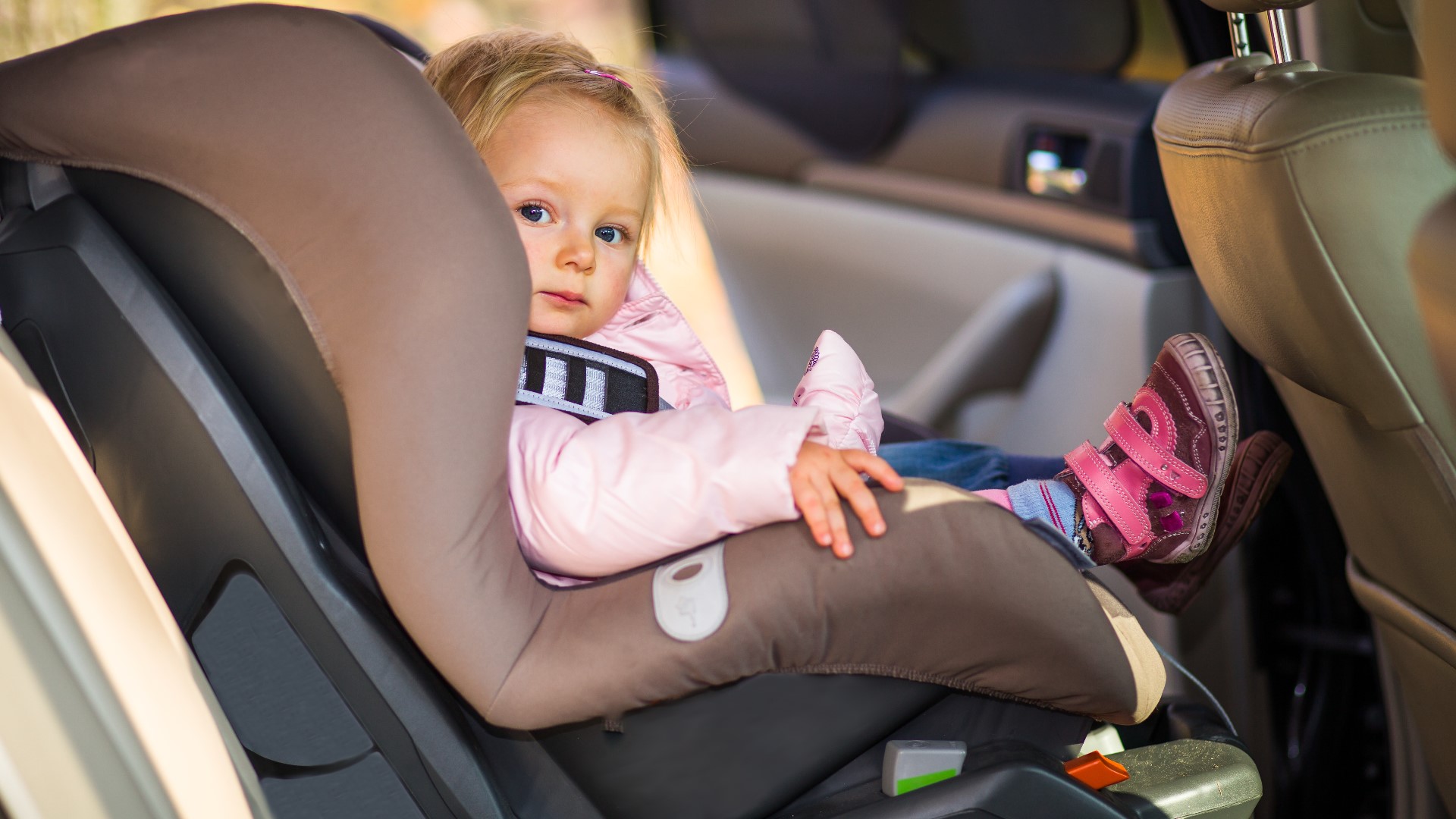 Bulky clothing, including winter coats and snowsuits, should never be worn underneath the harness of a car seat.
