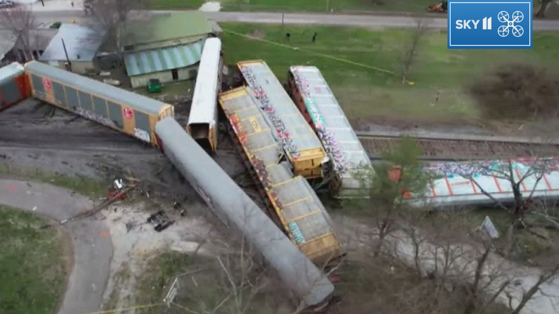 CSX officials released a statement saying the train went into emergency trying to avoid a crash with a semi-truck and trailer stuck on the Hodgenville Road crossing.