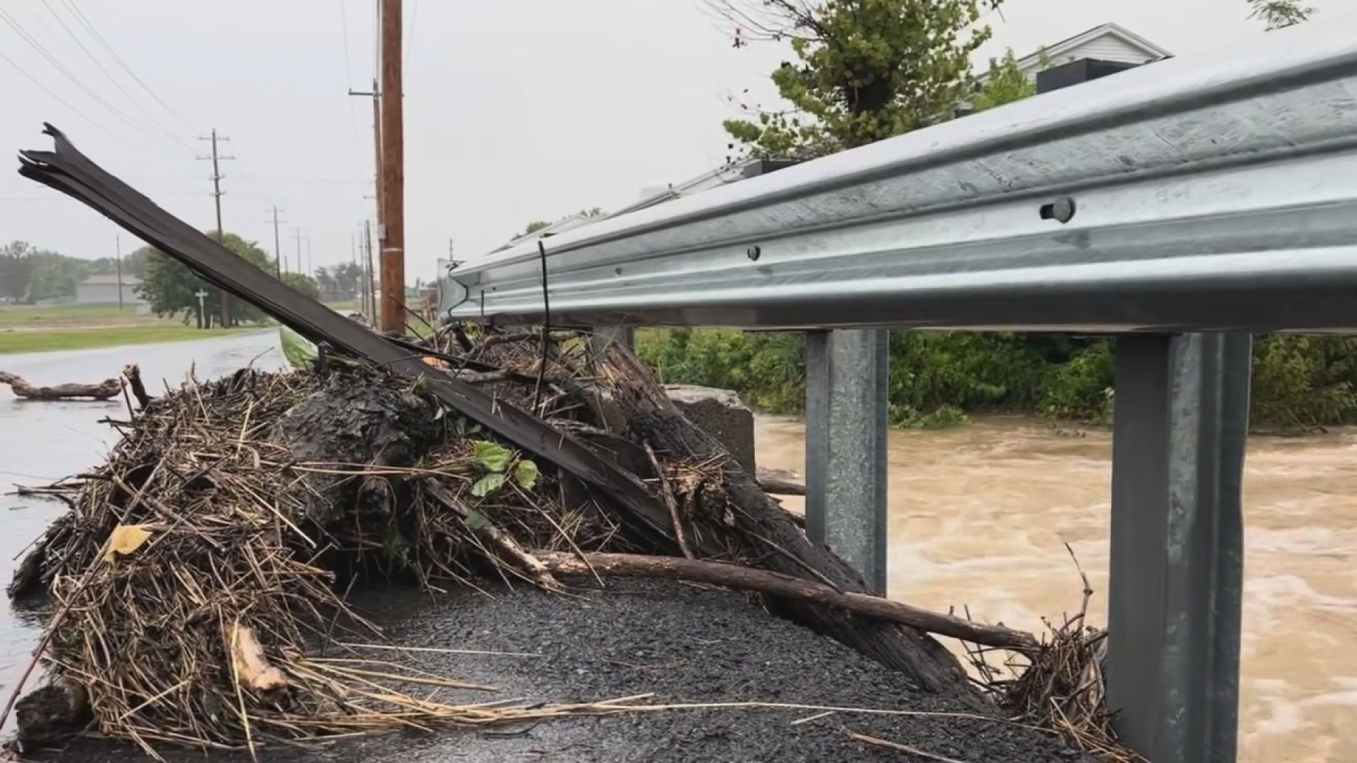 Storms moved through western Kentucky Tuesday night, flooding streets, cars, homes and knocking out power.