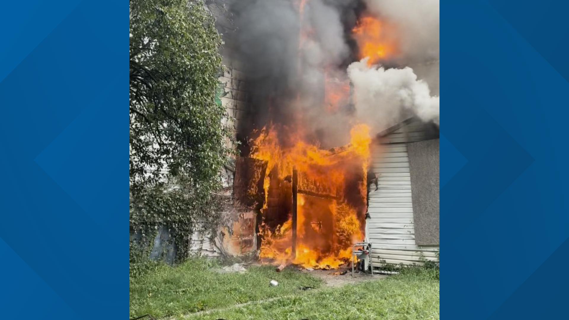 House fire displaces 3 in Russell neighborhood; cause under ...