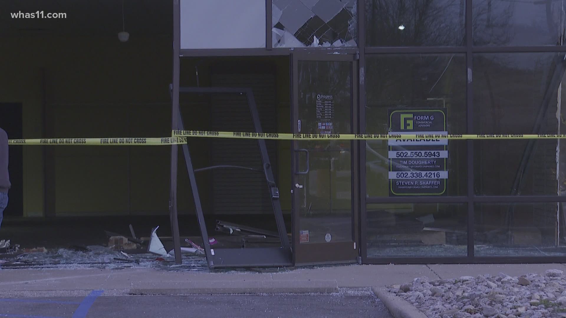 A former Payless Shoe Store in New Albany is taped off tonight after a woman drove into the building.