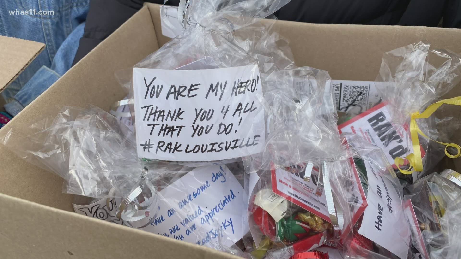 Students from Random Acts of Kindness Louisville flooded staff parking areas of several hospitals with goodies and positive messages as part of 23 day challenge.