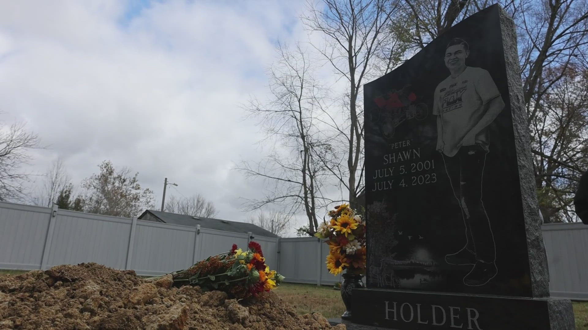 Family members were moved from Brookland Cemetery amid a legal battle over a lien placed on their son's grave.