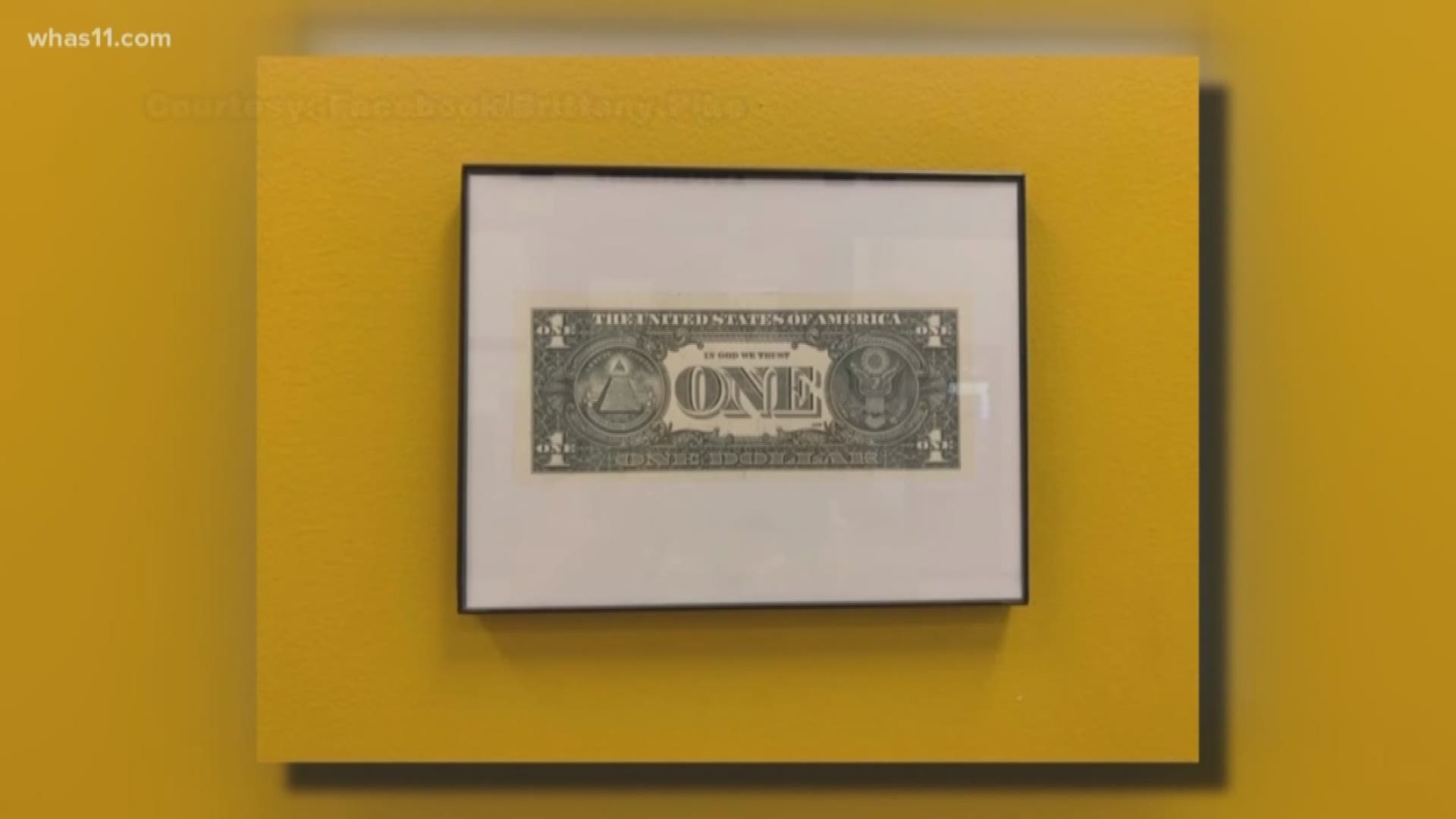 Fayette County Public Schools framed $1 bills that say 'In God We Trust' to workaround a state law requiring the phrase be displayed in schools.