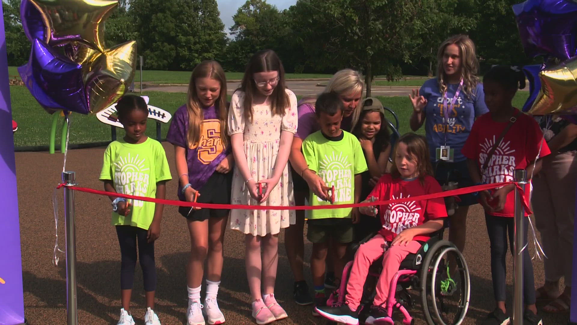 Stopher Elementary students cut the ribbon on Phase 1 of the project on Friday.