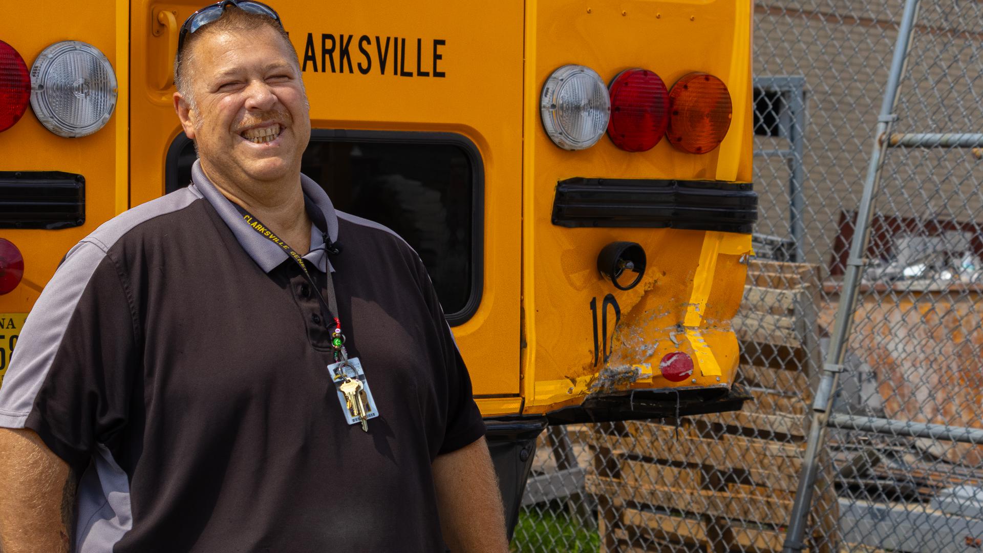 Michael Cain was doing his after-school route on Tuesday when a car rear-ended his school bus while nine students were onboard. No one on the bus was injured.