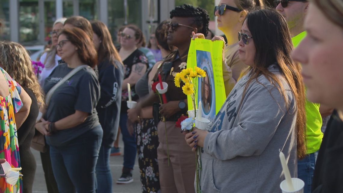 Crowd remembers Erica Riley, other domestic violence victims in
