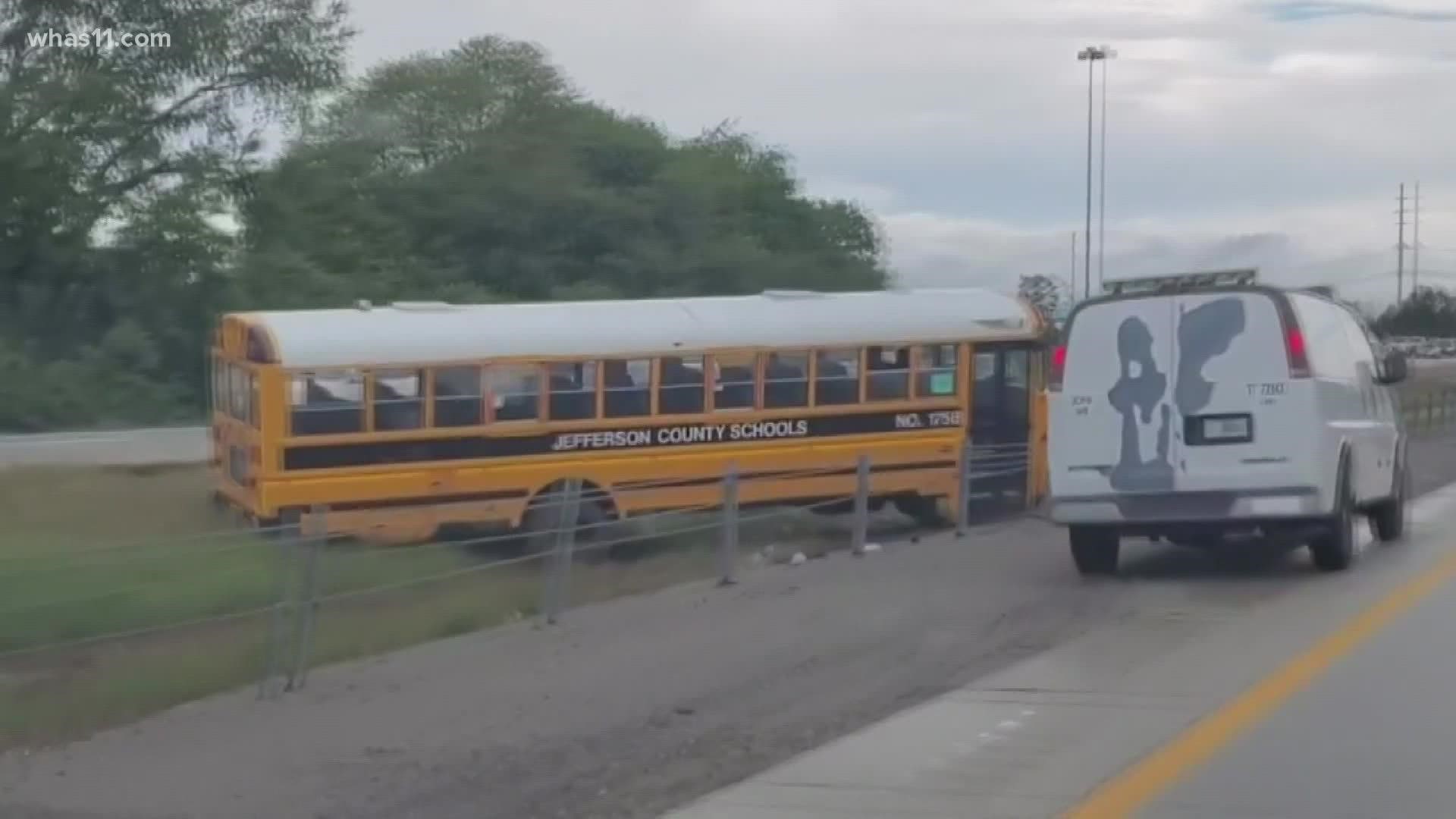 According to a Louisville Metro Police Department spokesperson, the bus had four students from Brandeis Elementary on board. No injuries were reported.