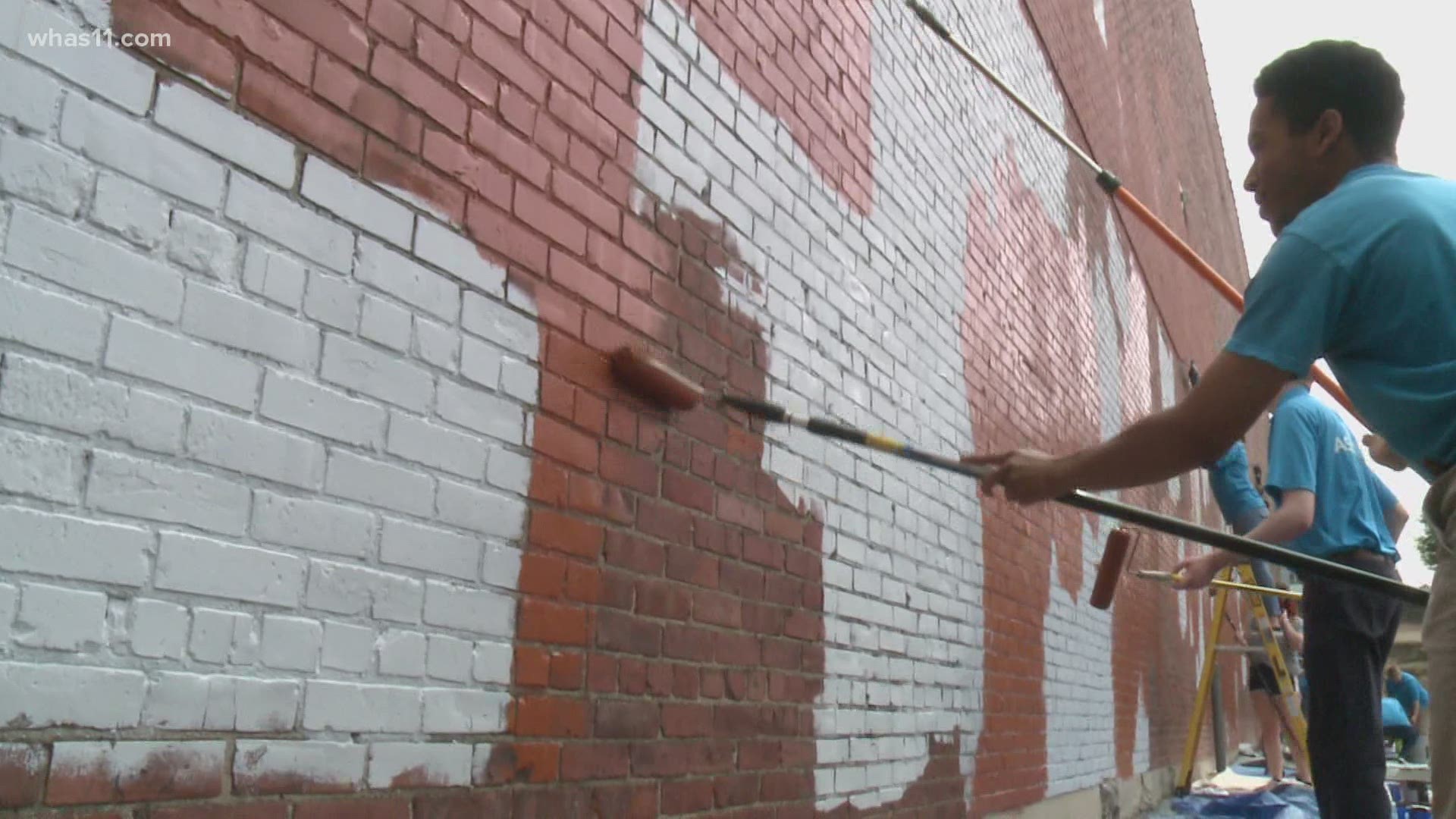 Save the Earth from A to Z took part in cleaning the graffiti in parts of downtown Louisville and near the University of Louisville campus.