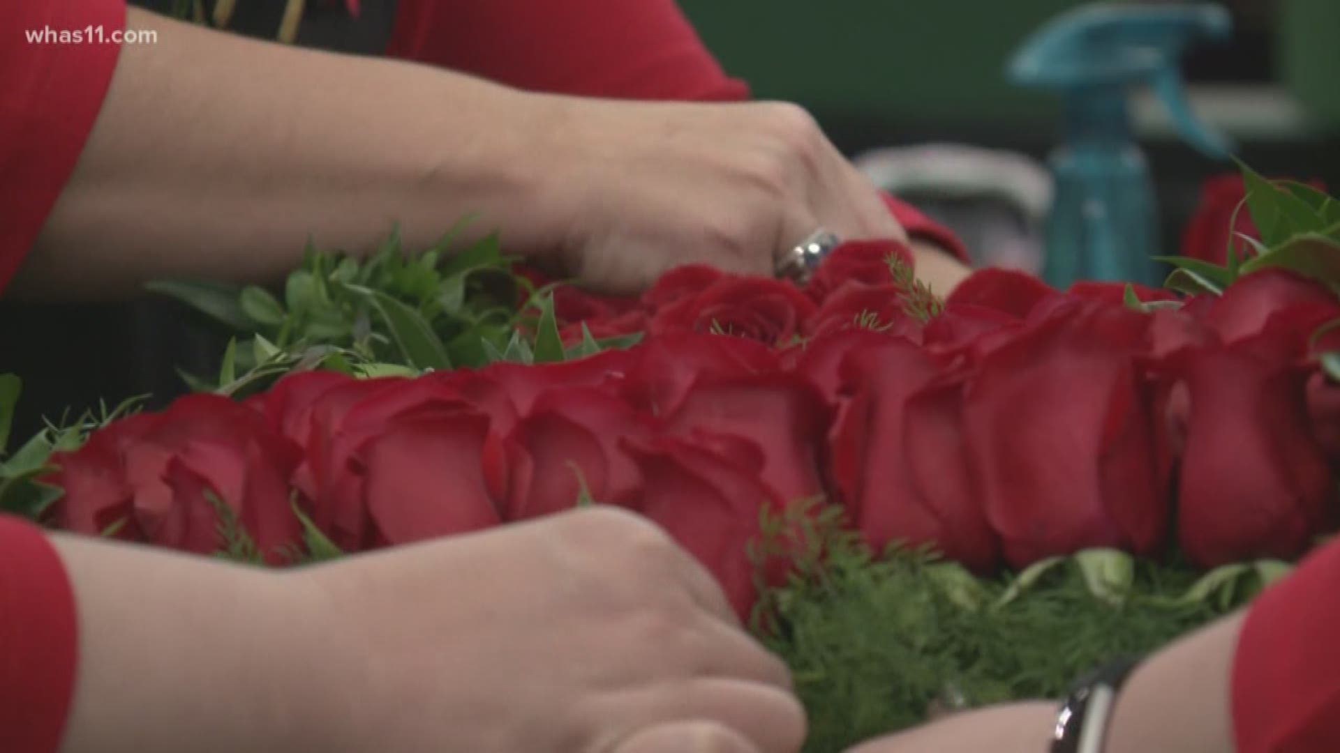 Kroger employees put together famed garland of roses