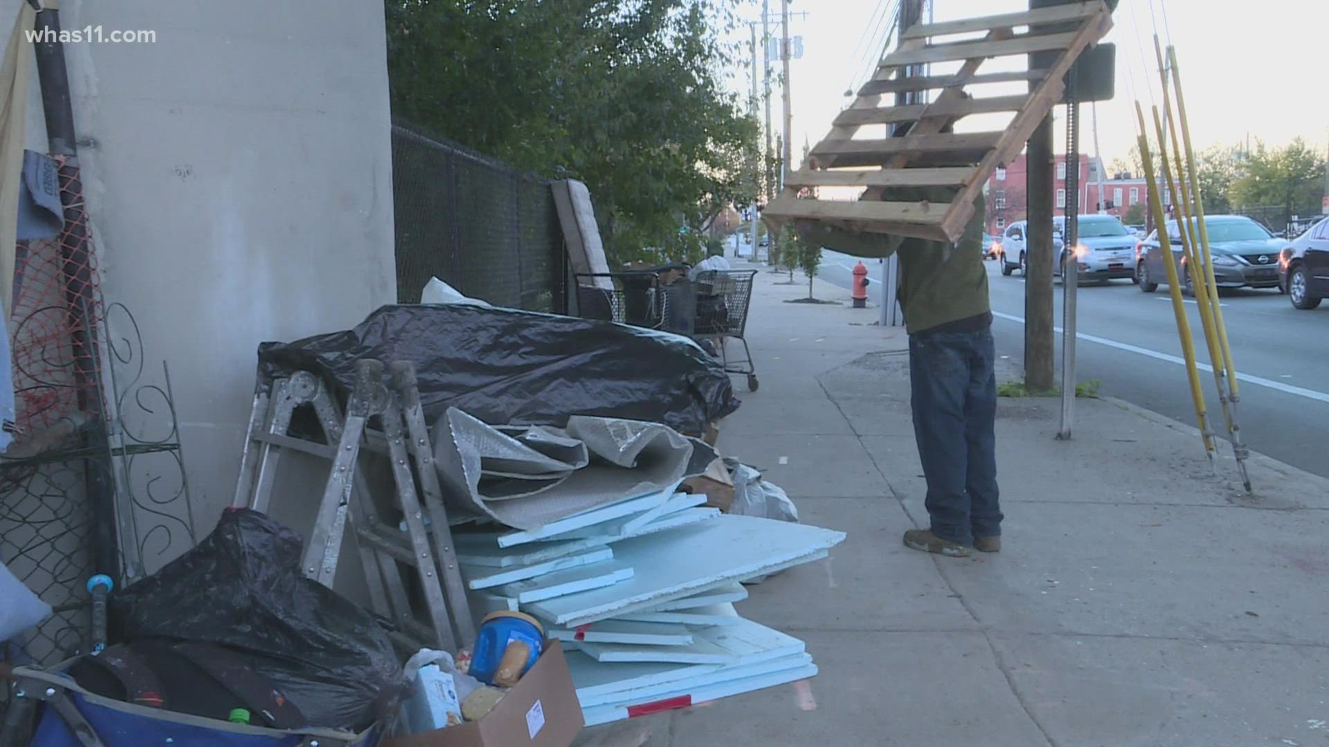 Ray was one of a handful of people who had to gather their belongings and leave as the city cleared out a homeless encampment at 9th and Market.
