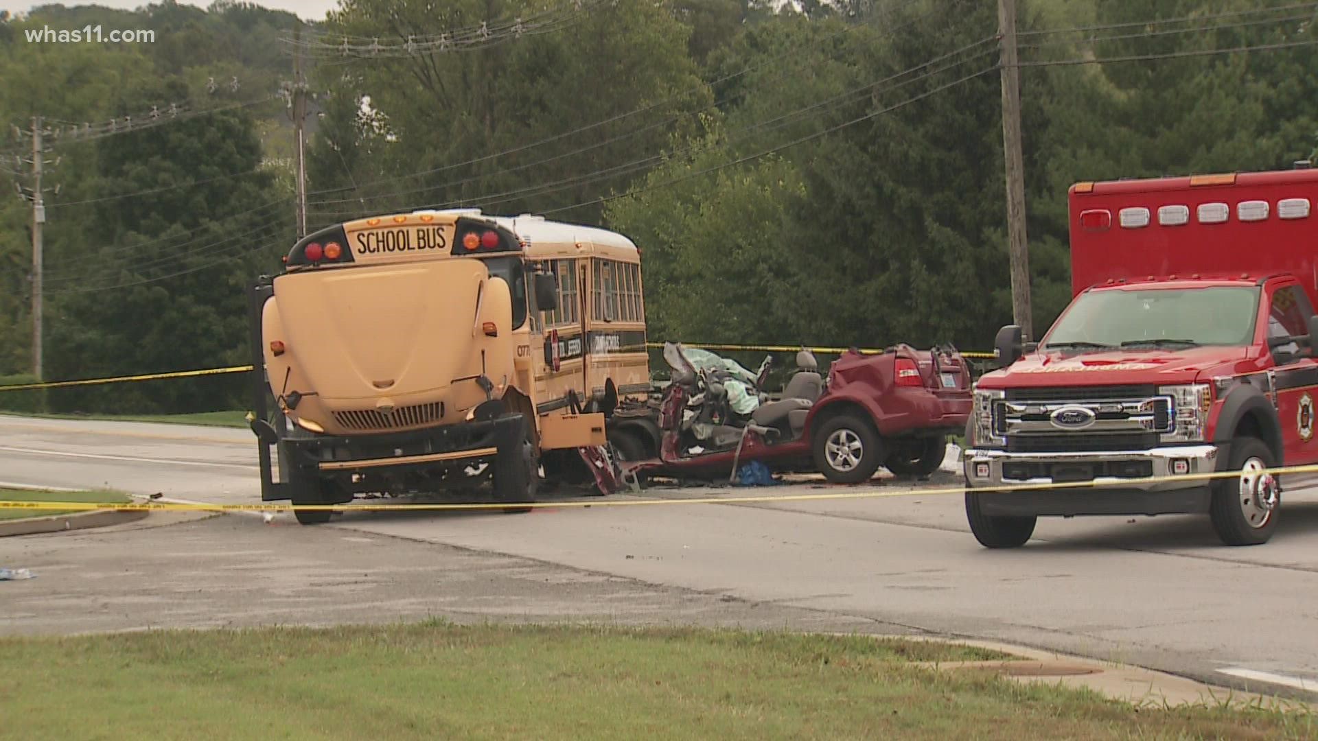 JCPS said the bus had 60 students on board when a car crashed into it on Ballardsville Road. Police said the driver of the car died at the scene.