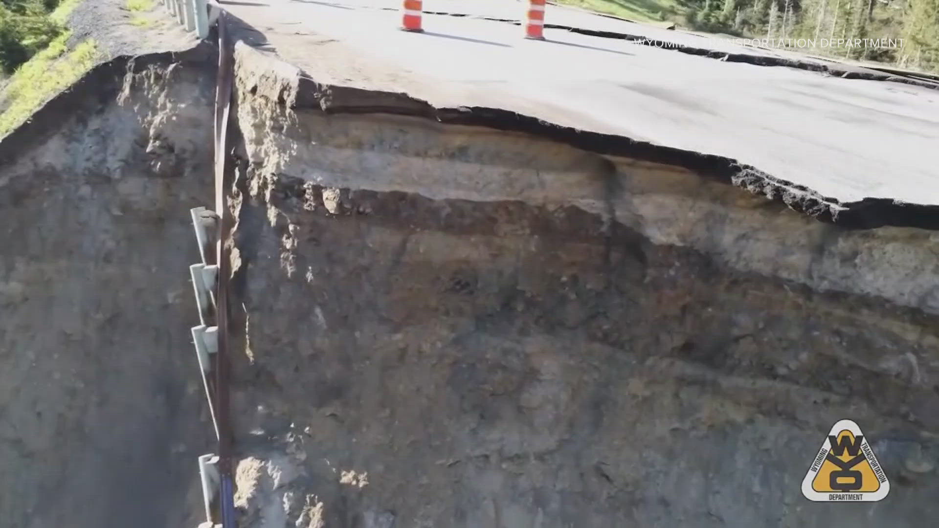 Aerial photos and drone video show the Teton Pass road riven with deep cracks, and a big section of the pavement has disappeared altogether.