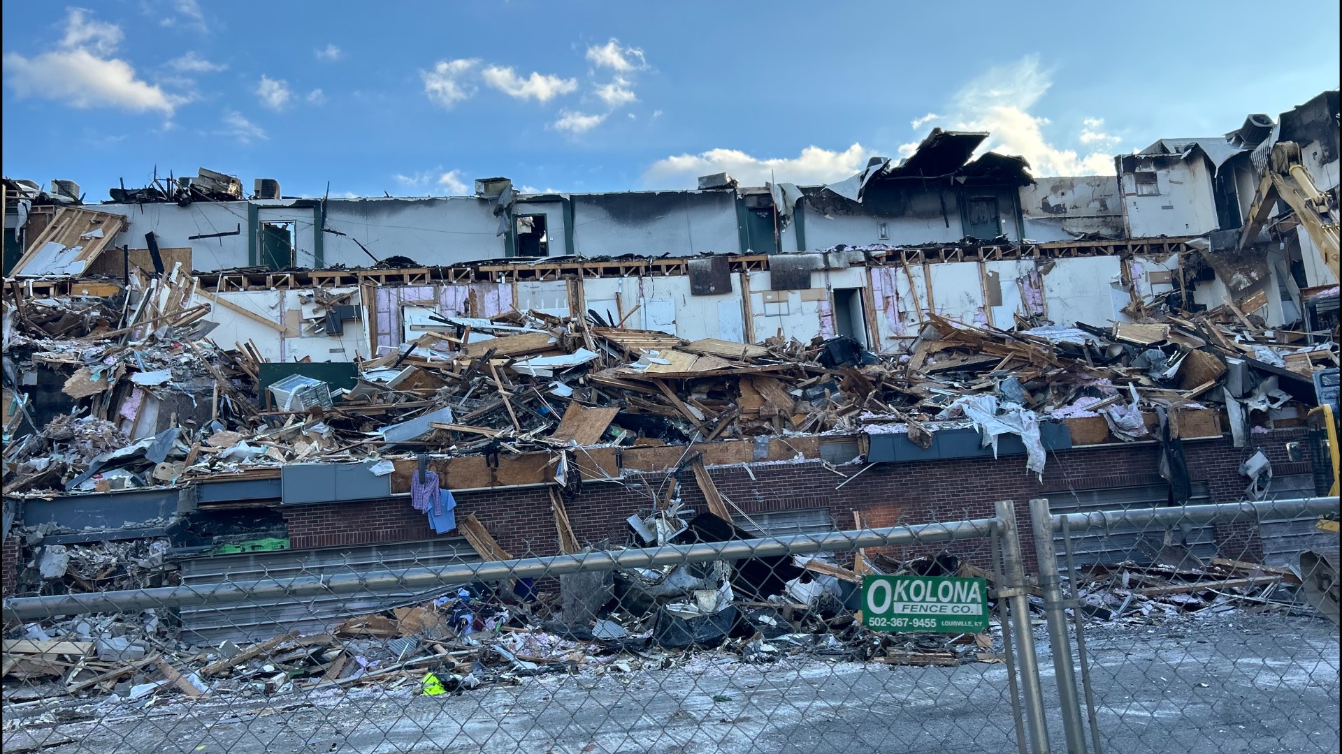 A massive fire caused the building's interior to collapse earlier this week. All 64 residents were displaced.