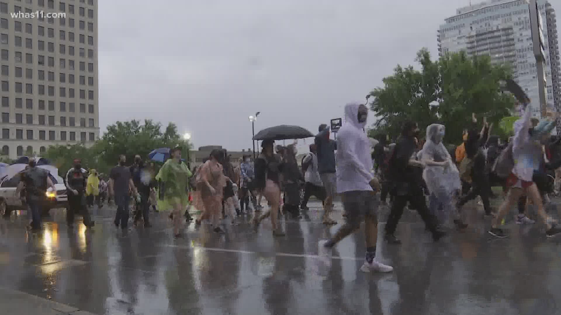 Despite the rain, peaceful protesters continued their demonstrations for justice.