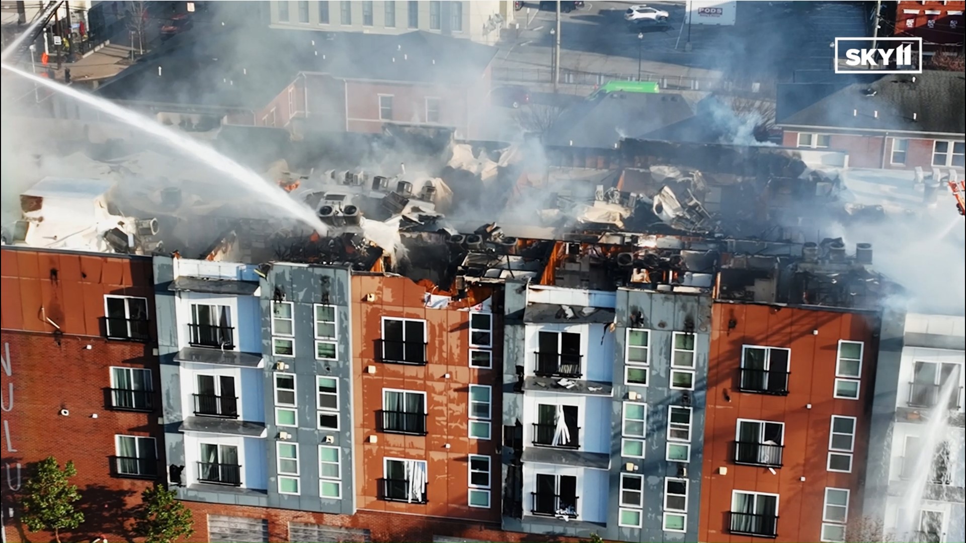 DRONE 100 firefighters battle huge apartment fire in Louisville