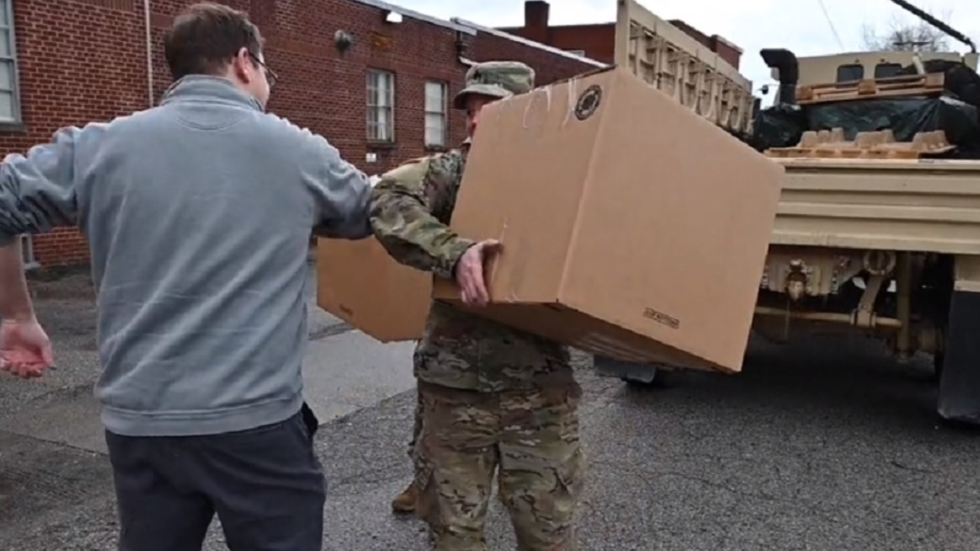 Members of the West Virginia National Guard deliver medical supplies to Highland Hospital and the Kanawha County Health Department.