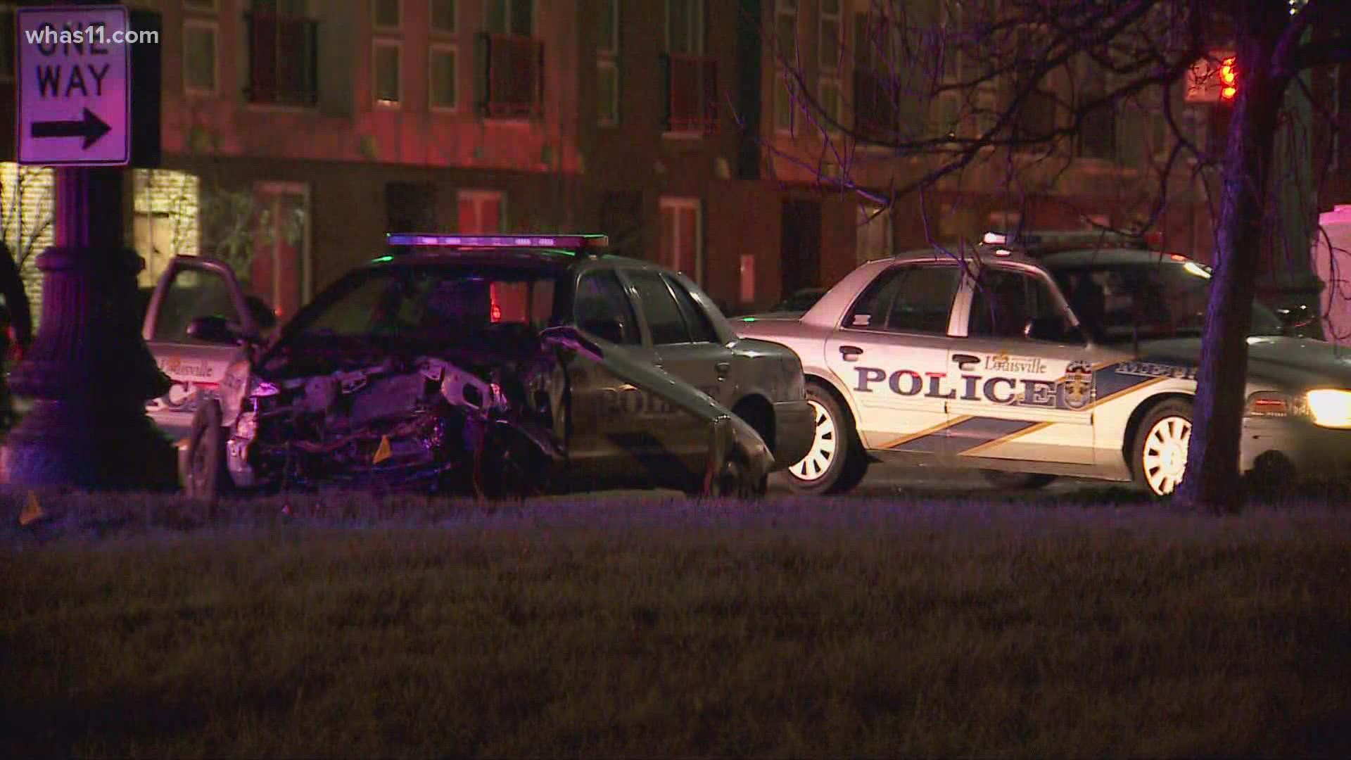 A LMPD officer's patrol vehicle was struck by a fleeing car Monday morning. Minor injuries are being reported