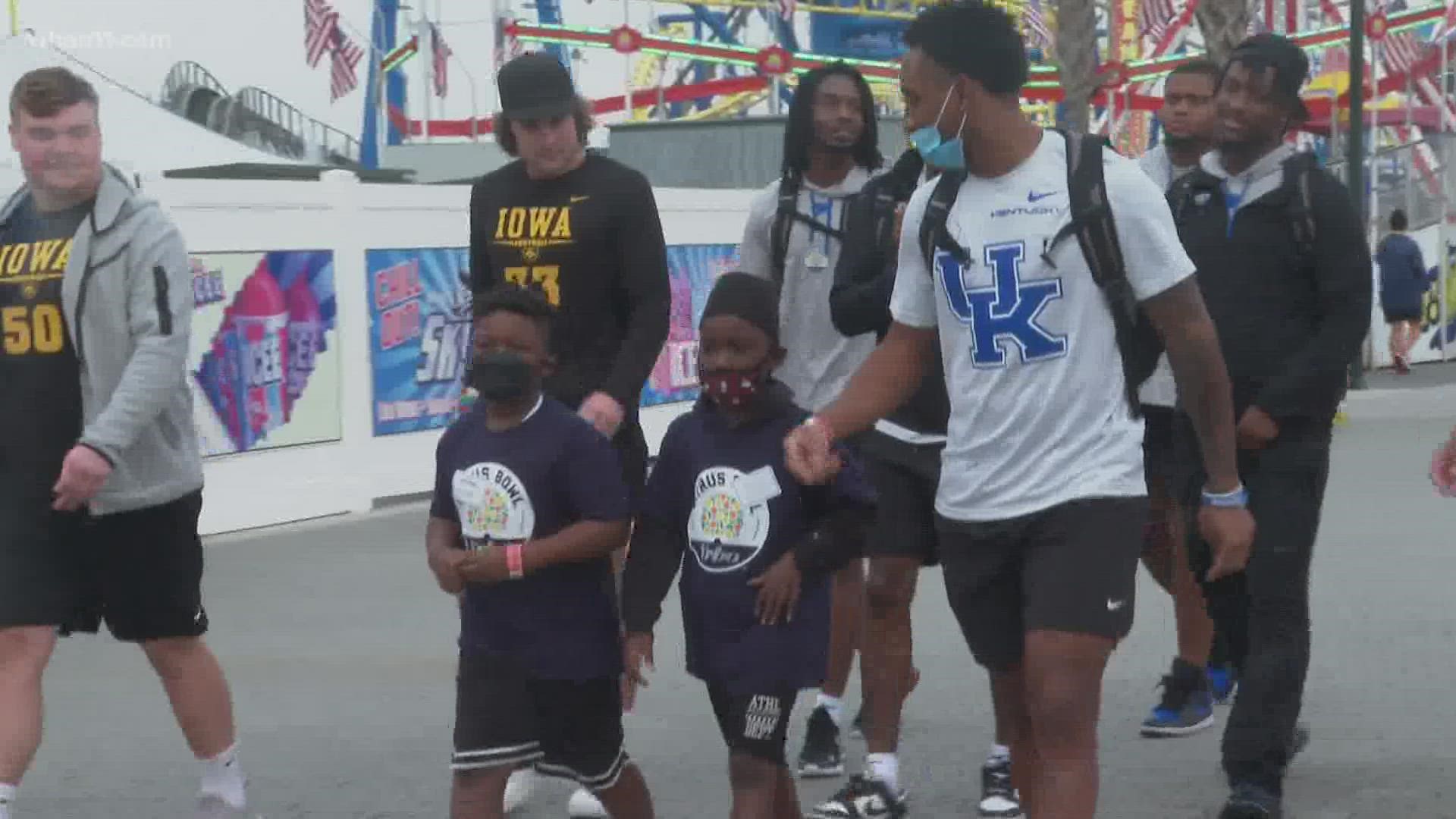 UK senior nose guard and his partner were the perfect pair during the Citrus Bowl Day for Kids.