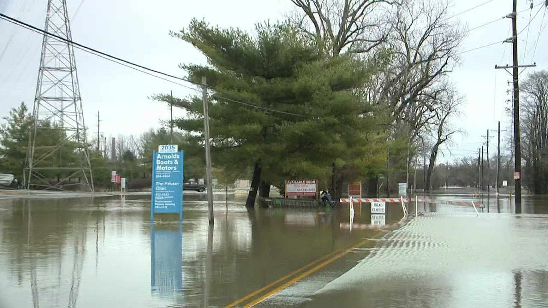 Parts of River Rd. are underwater and it's forcing families out of their homes.