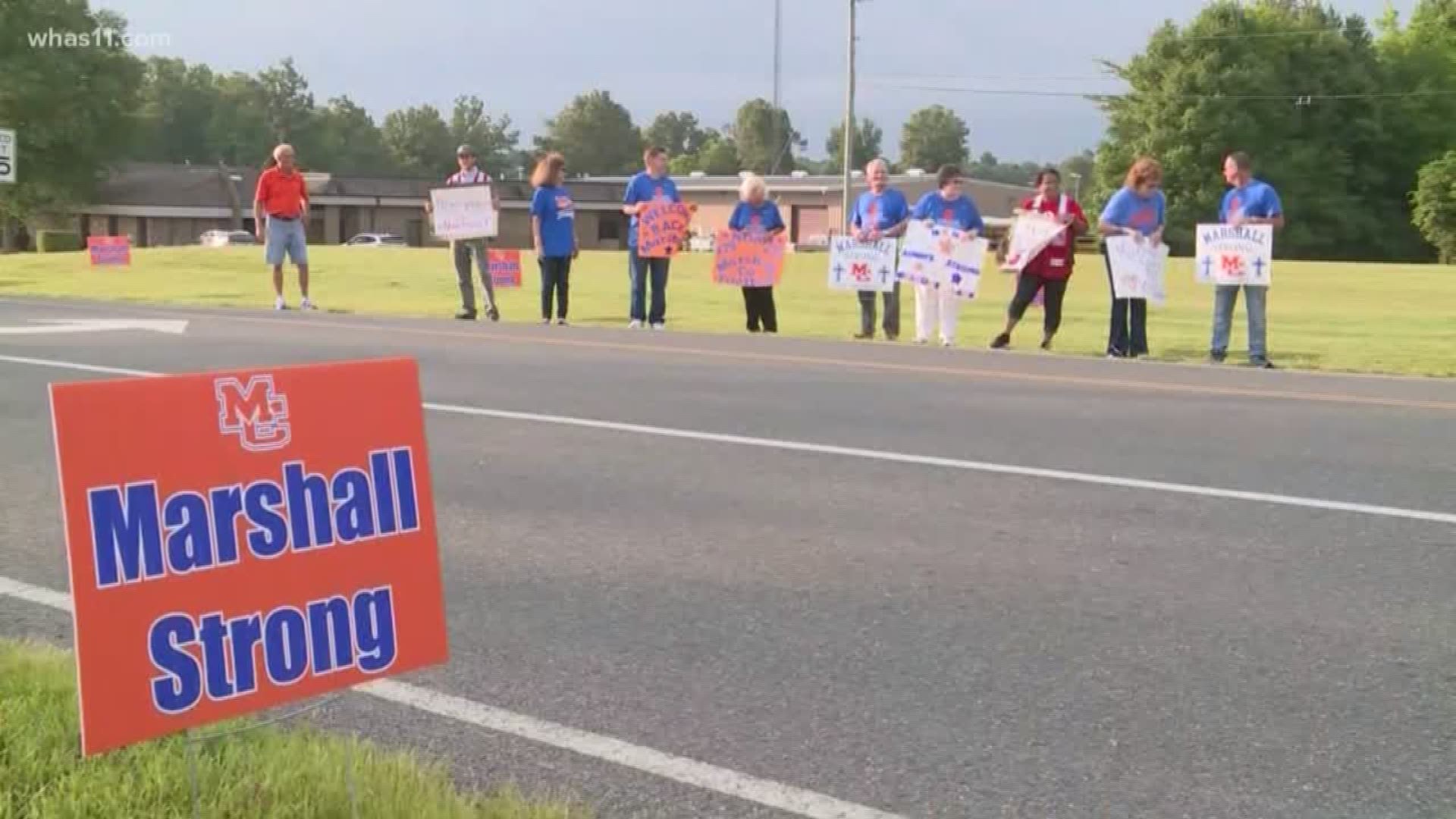 The community of Marshall County came together to cheer on students as they returned to school on Thursday