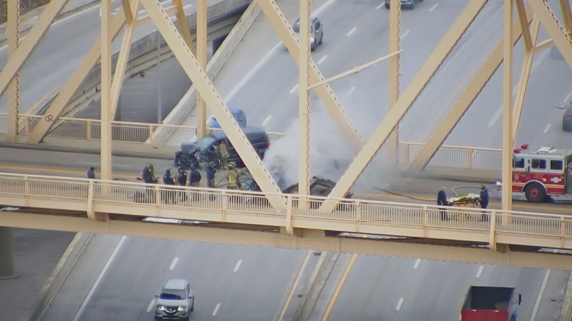 A three-vehicle crash in downtown Louisville shut down the Clark Memorial Bridge for hours.