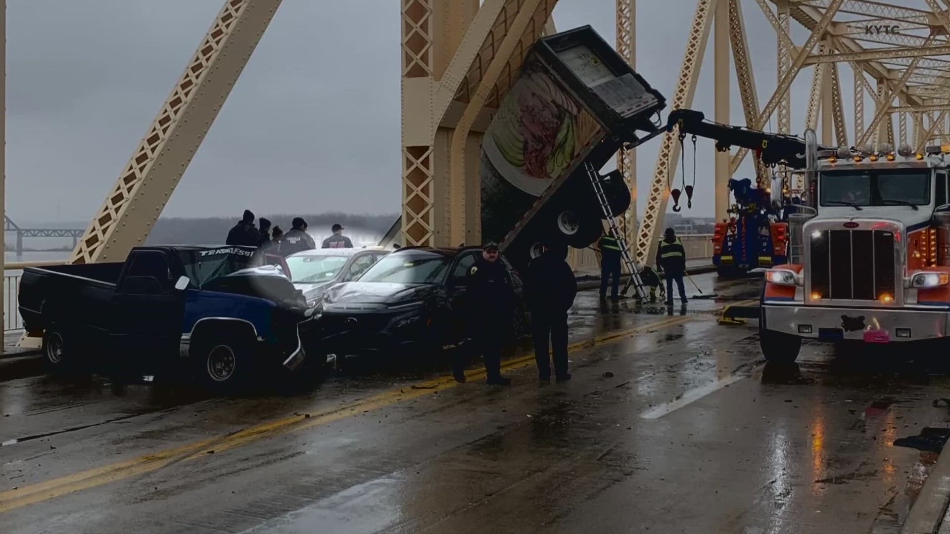 She's the driver whose car stalled on the Clark Memorial Bridge Friday, moments before a multi-car collision sent a Sysco semi over the edge.