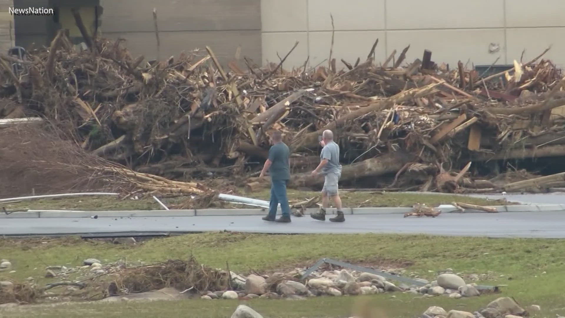 Eleven employees were swept away by the flood waters, and their colleagues believe those employees were told they weren't allowed to leave.