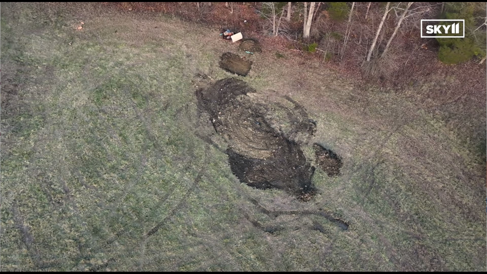 RAW: Drone footage of authorities searching property for evidence in