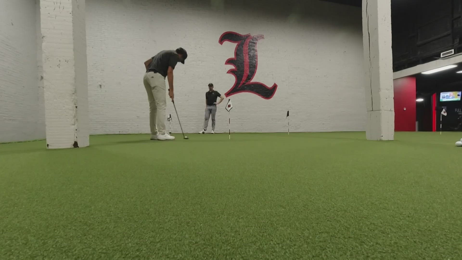 The University of Louisville Golf Team's indoor facility is where players train and bond as a team.