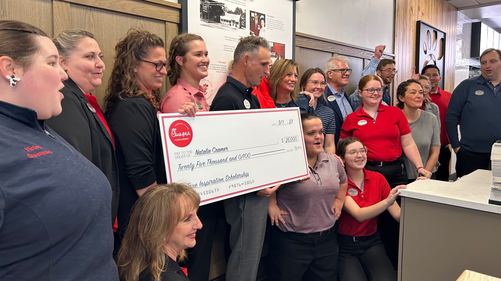A Greenwood Chick-fil-A employee received a surprise scholarship while at work.